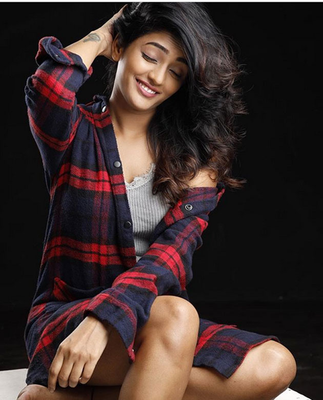 Photo Story: Eesha Teases In Unbuttoned Shirt