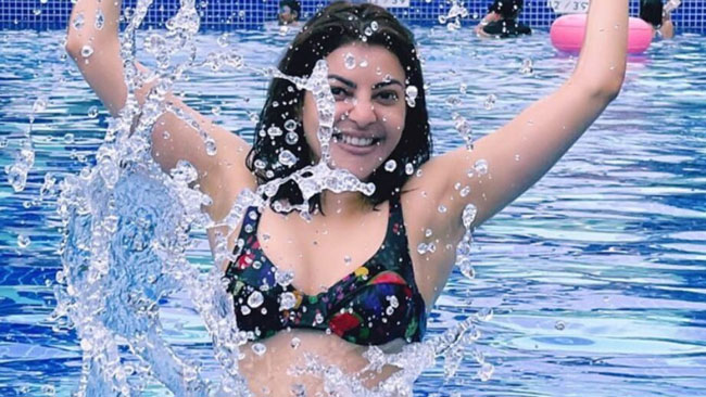 Photostory: Kajal Slips Into A Bikini & Enjoys In Pool!